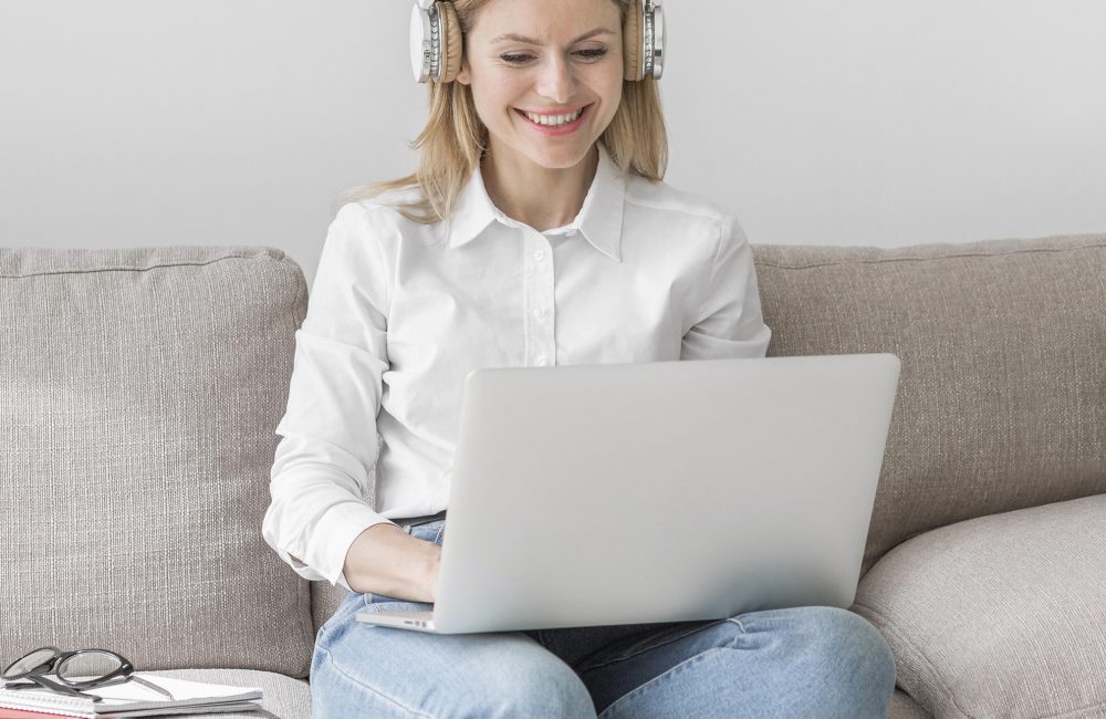 young-teacher-with-headphones-getting-ready-online-class