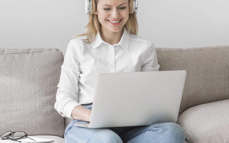 young-teacher-with-headphones-getting-ready-online-class